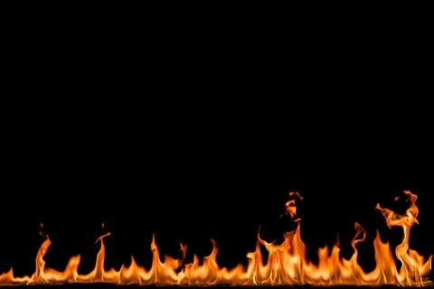 Fire flames on black background. Stock Photos