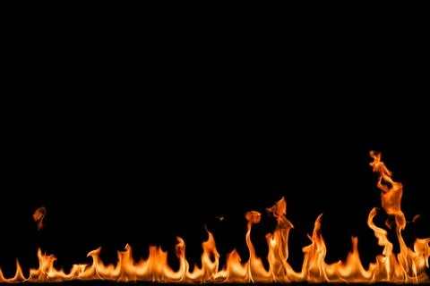 Fire flames on black background. Stock Photos
