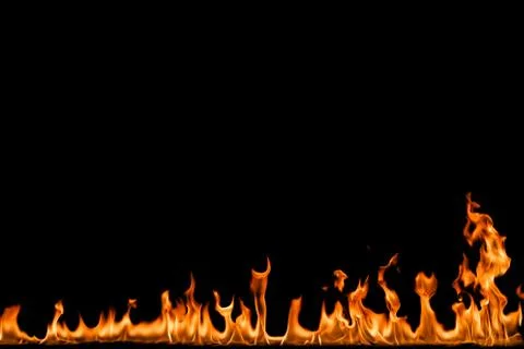 Fire flames on black background. Stock Photos