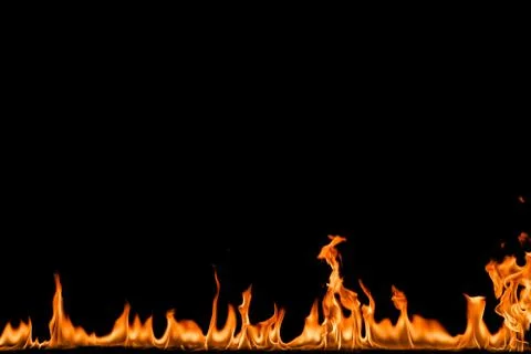Fire flames on black background. Stock Photos
