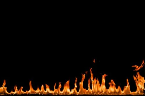 Fire flames on black background. Stock Photos