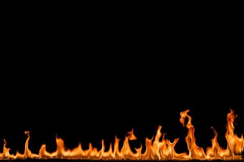 Fire flames on black background. Stock Photos