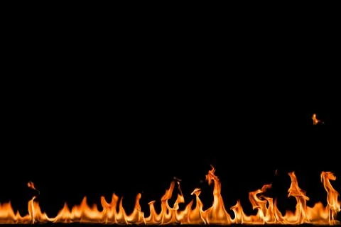 Fire flames on black background. Stock Photos