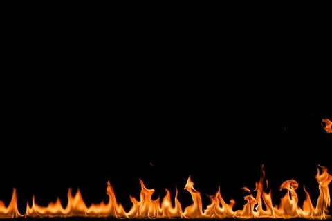 Fire flames on black background. Stock Photos