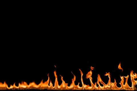 Fire flames on black background. Stock Photos