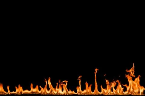 Fire flames on black background. Stock Photos
