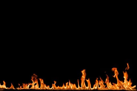 Fire flames on black background. Stock Photos