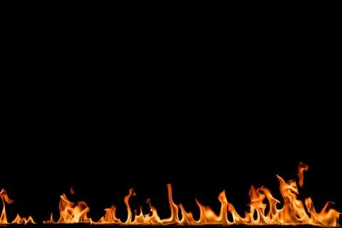 Fire flames on black background. Stock Photos