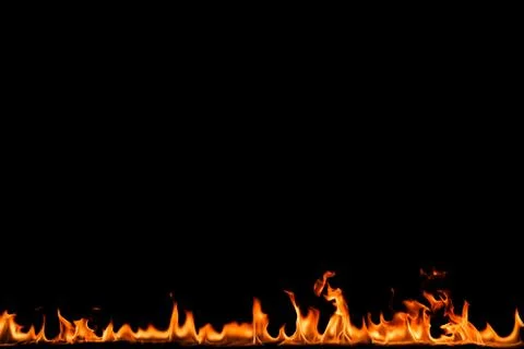 Fire flames on black background. Stock Photos