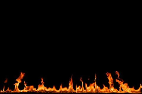 Fire flames on black background. Stock Photos
