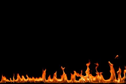 Fire flames on black background. Stock Photos