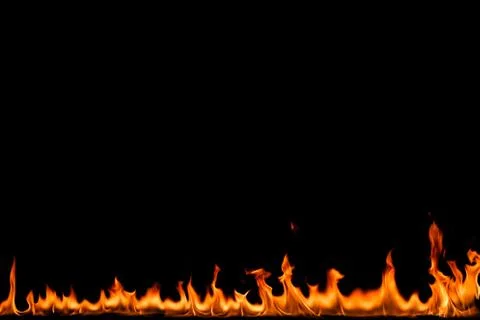 Fire flames on black background. Stock Photos
