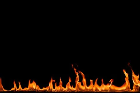 Fire flames on black background. Stock Photos