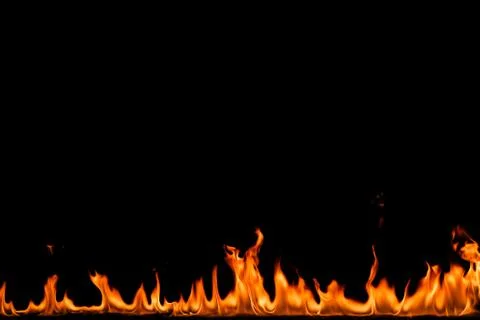 Fire flames on black background. Stock Photos