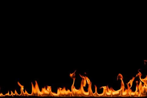 Fire flames on black background. Stock Photos