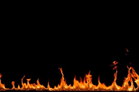 Fire flames on black background. Stock Photos