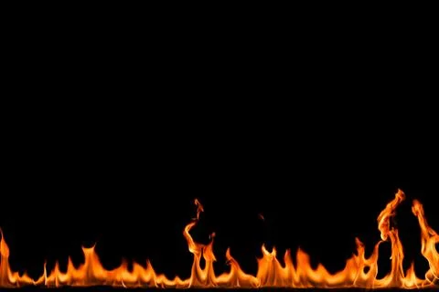 Fire flames on black background. Stock Photos