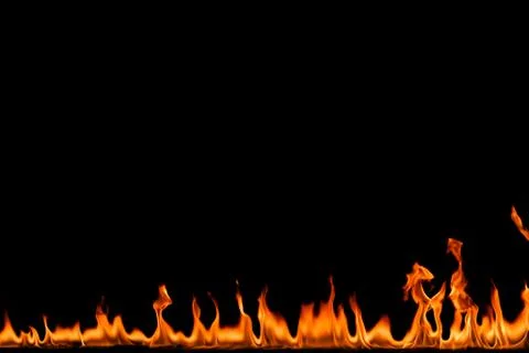 Fire flames on black background. Stock Photos