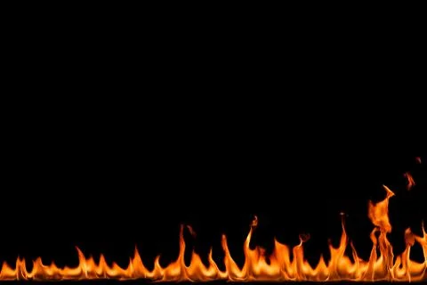Fire flames on black background. Stock Photos