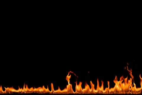 Fire flames on black background. Stock Photos