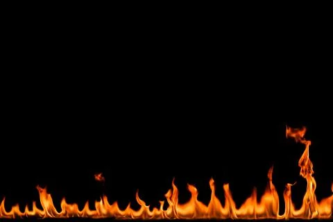 Fire flames on black background. Stock Photos