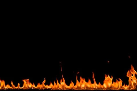Fire flames on black background. Stock Photos