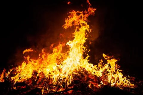 Fire flames on black background Stock Photos