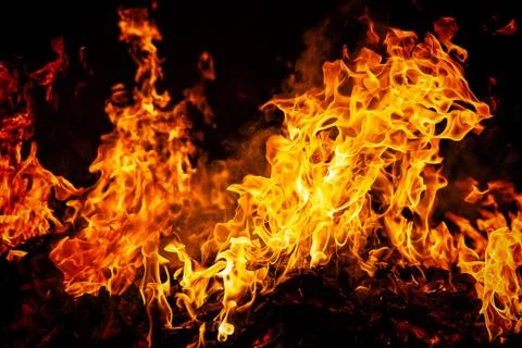 Fire flames on black background Stock Photos