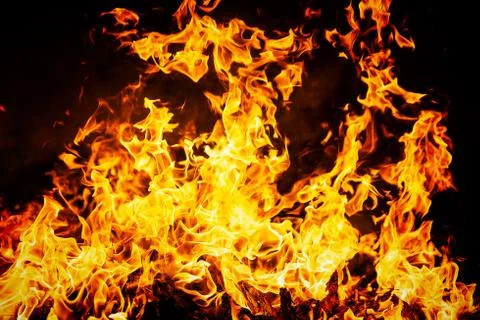 Fire flames on black background Stock Photos