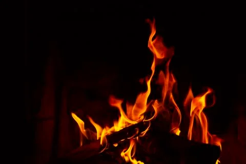 Fire flames on black background Stock Photos