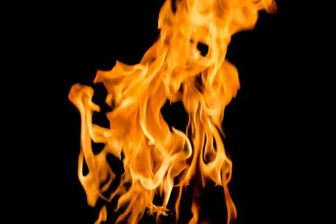 Fire flames on black background. Stock Photos