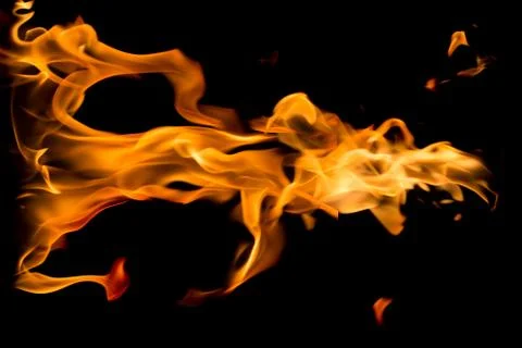 Fire flames on black background. Stock Photos