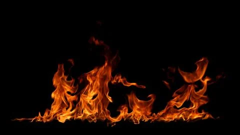 Fire flames on black background. Stock Photos