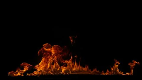 Fire flames on black background. Stock Photos