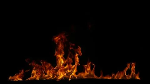 Fire flames on black background. Stock Photos