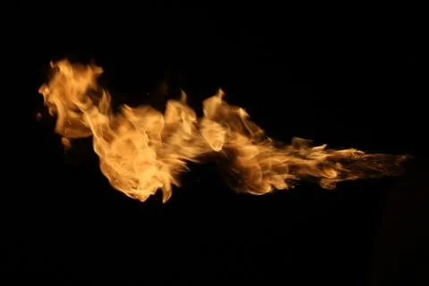 Fire flames on black background. Stock Photos