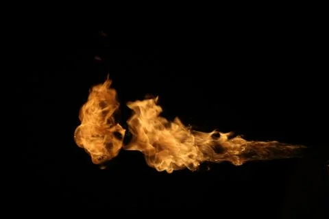Fire flames on black background. Stock Photos
