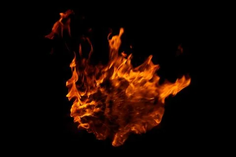 Fire flames on black background. Stock Photos