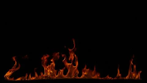 Fire flames on black background. Stock Photos