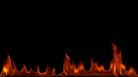 Fire flames on black background. Stock Photos