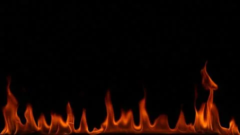 Fire flames on black background. Stock Photos