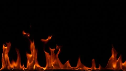 Fire flames on black background. Stock Photos