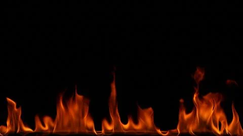 Fire flames on black background. Stock Photos
