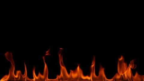 Fire flames on black background. Stock Photos