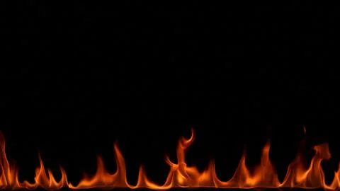 Fire flames on black background. Stock Photos