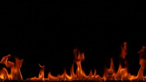 Fire flames on black background. Stock Photos
