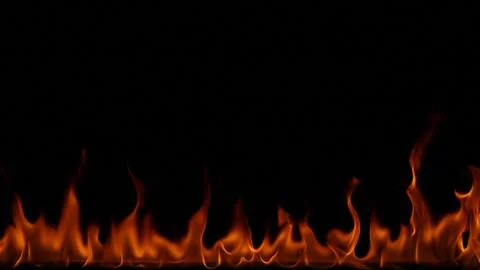 Fire flames on black background. Stock Photos