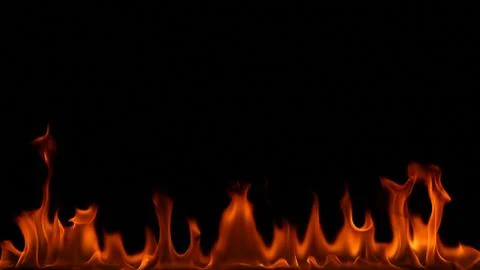 Fire flames on black background. Stock Photos