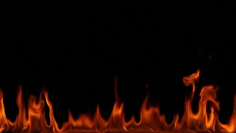 Fire flames on black background. Stock Photos