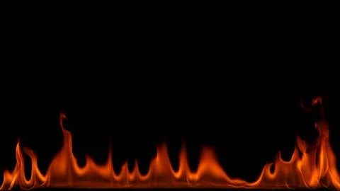 Fire flames on black background. Stock Photos